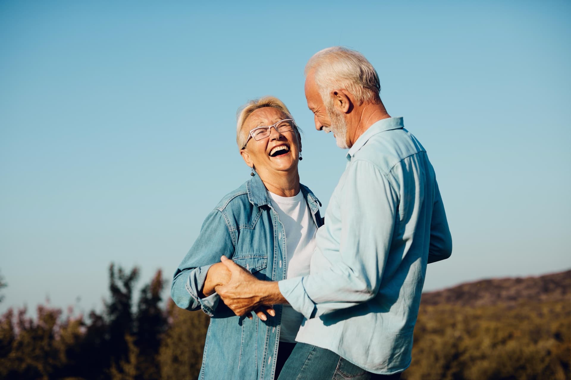 Couple embracing after treatment at Aspire Health